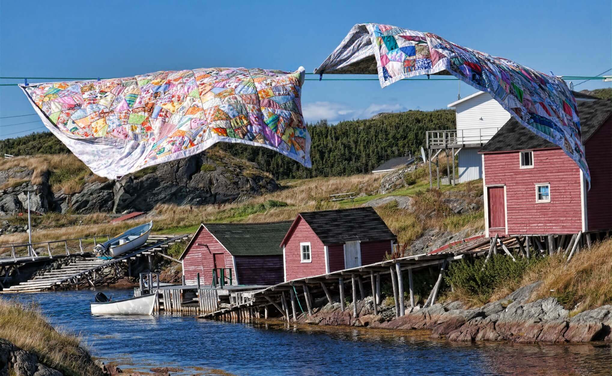 Quilts flapping on the clothesline