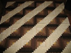 Straight Furrows variation of Amish Log Cabin quilt block