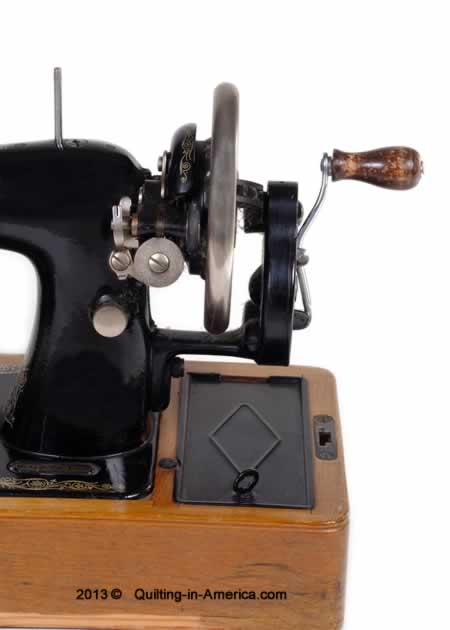 Antique hand-crank sewing machine